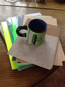 notebooks and cup